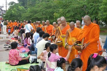 Alms Giving & Morning Market Tour and Breakfast